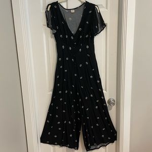 O’Neill black floral button-front jumpsuit with flutter sleeves